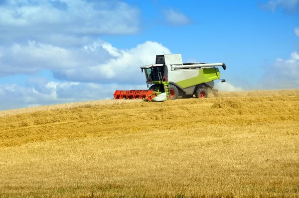 Agricultural vehicle on the field — Stock Photo, Image