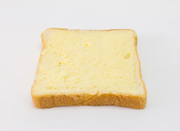 Pão fatiado com açúcar e manteiga em cima isolado em branco — Fotografia de Stock