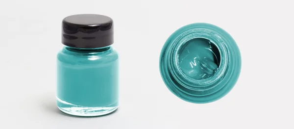 Kadettenblau Acrylfarbe Flasche Seiten- und Draufsicht weiß isoliert — Stockfoto