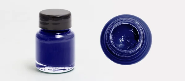 Mitternachtsblau Acrylfarbe Flasche Seiten- und Draufsicht weiß isoliert — Stockfoto