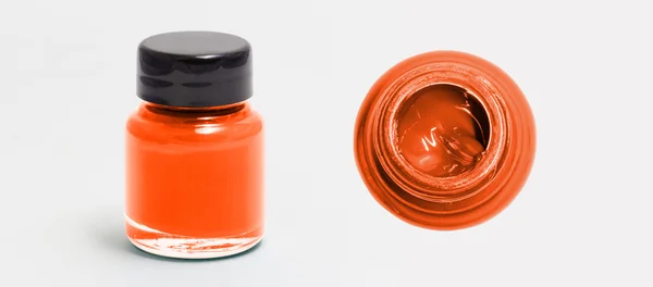 Orangere dacrylic kleur fles kant en bovenaanzicht-witte geïsoleerd — Stockfoto