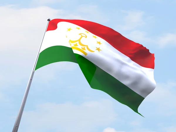 Tajikistan flag flying on clear sky. — Stock Photo, Image