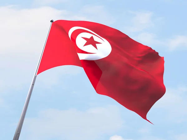 Tunisia lippu liehuu kirkkaalla taivaalla . — kuvapankkivalokuva