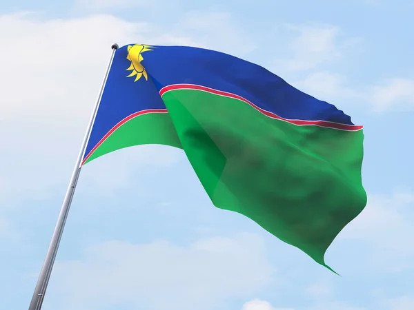 纳米比亚旗帜迎风飘扬在晴朗的天空. — 图库照片