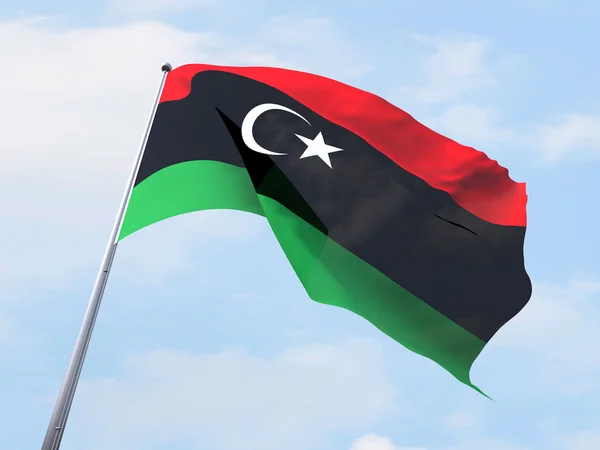 Libya lippu liehuu kirkkaalla taivaalla . — kuvapankkivalokuva