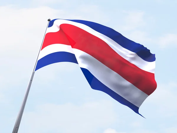 Banderą Kostaryki na jasne niebo. — Zdjęcie stockowe
