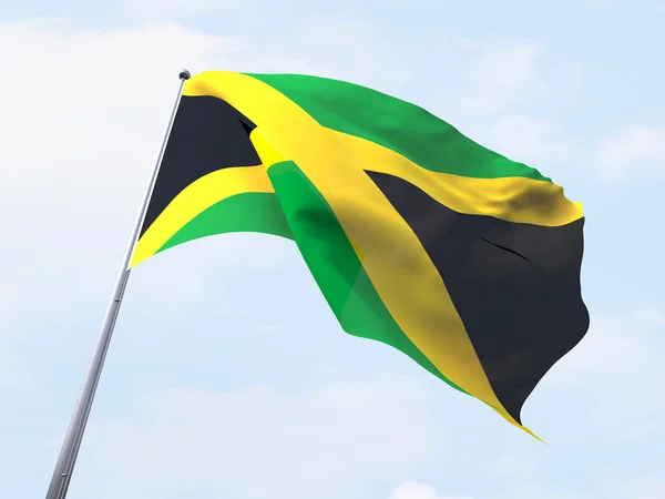 Jamaica flag flying on clear sky. — Stock Photo, Image