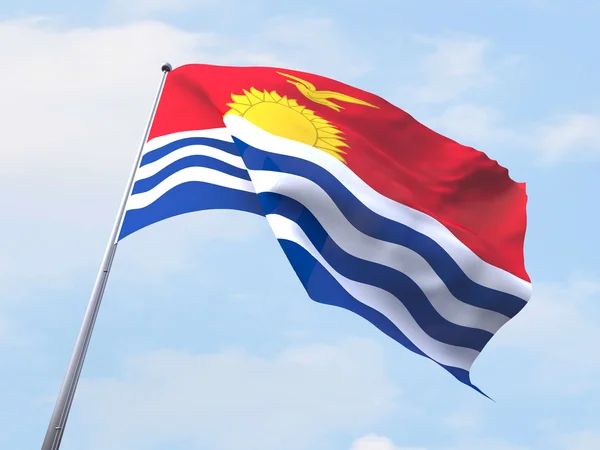 基里巴斯旗帜迎风飘扬在晴朗的天空. — 图库照片