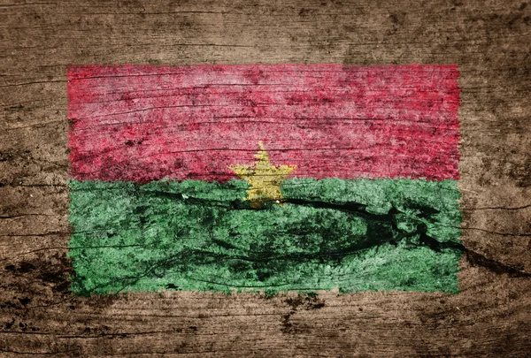 Σημαία της Μπουρκίνα Φάσο ζωγραφισμένα σε ξύλο φόντο — Φωτογραφία Αρχείου