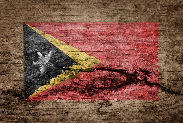 东帝汶国旗画在木材的背景 — 图库照片