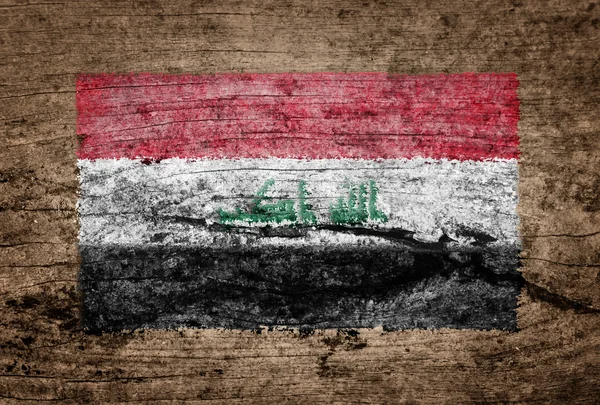 Irak flag malet på træ baggrund - Stock-foto