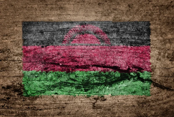 Bandeira do Malawi pintada sobre fundo de madeira — Fotografia de Stock