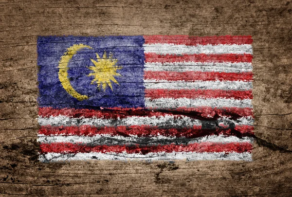 Malaysia Flagge auf Holz Hintergrund gemalt — Stockfoto