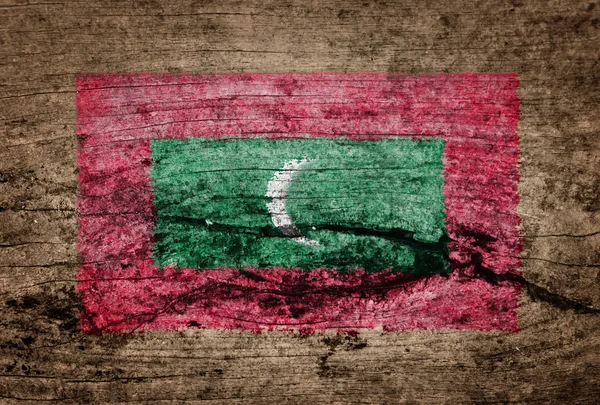 Maldivene Flagg malt på trebakgrunn – stockfoto