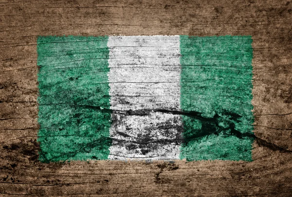 Nigeria lippu maalattu puupohjalle — kuvapankkivalokuva
