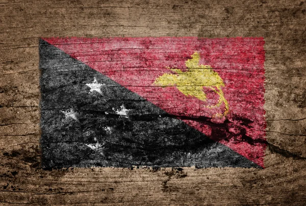 巴布亚新几内亚的国旗上木背景画 — 图库照片