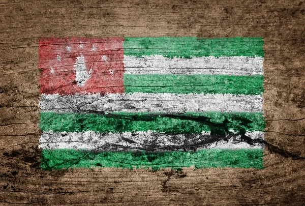 Bandeira da Abcásia pintada sobre fundo de madeira — Fotografia de Stock