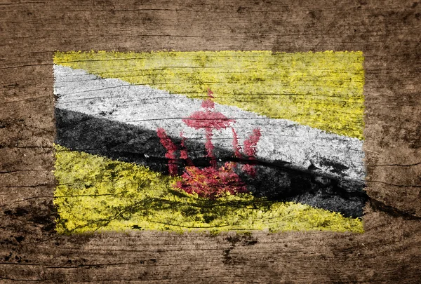 Bandeira Brunei pintada sobre fundo de madeira — Fotografia de Stock