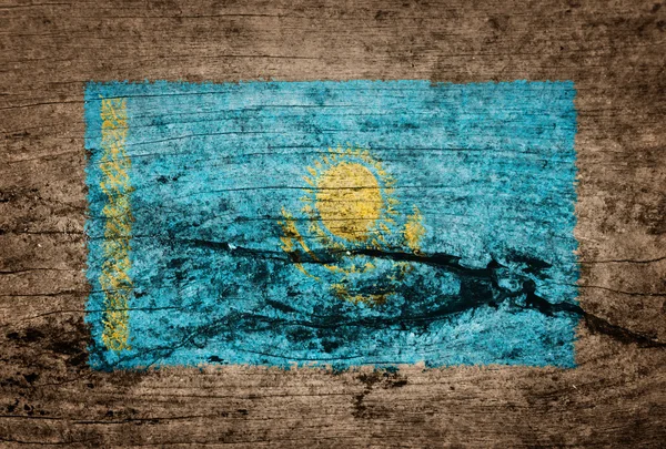 Bandeira do Cazaquistão pintada sobre fundo de madeira — Fotografia de Stock