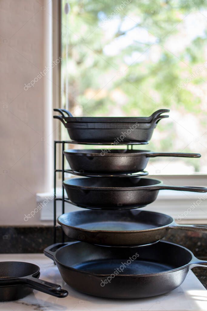 Easy way to organize kitchen skillets and pan rack,  and aid in gaining space and efficiency