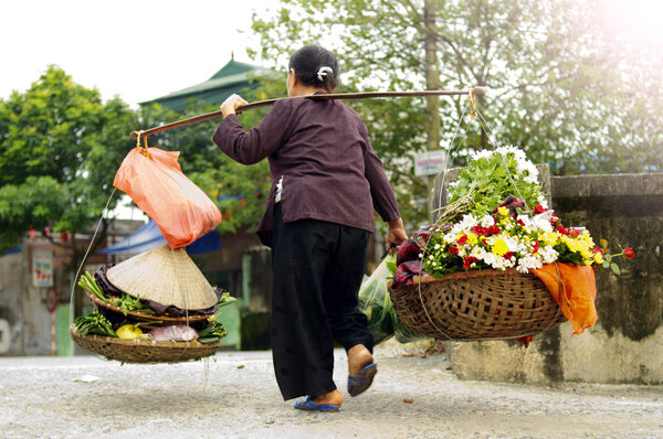 Vietnam florist vendor on hanoi street, Vietnam.  This is small market for vendors of hanoi, vietnam.