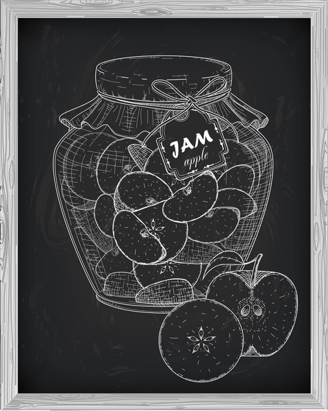 beautiful jar of homemade jam with apple on a black background