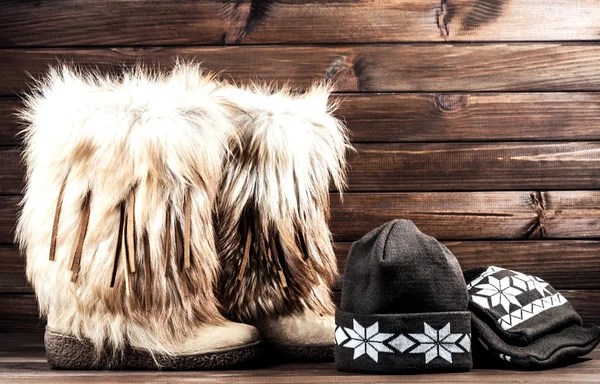 Female winter boots, hat and scarf — Stock Photo, Image