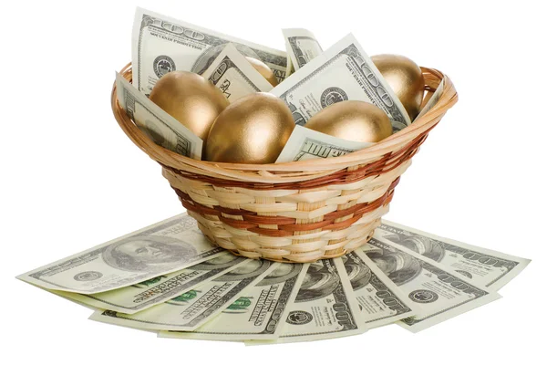 Zlatá vejce a dolary v košíku, samostatný — Stock fotografie