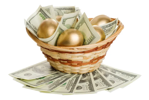 Golden eggs and dollars in a basket isolated — Stock Photo, Image