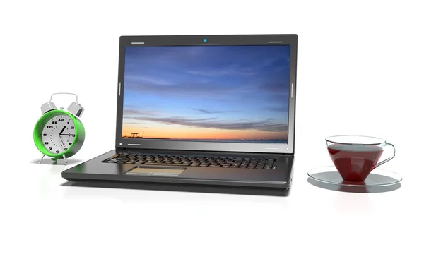 Laptop, csésze forró thea és ébresztőóra — Stock Fotó