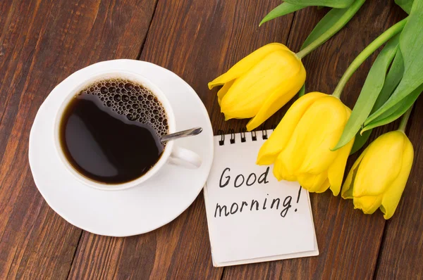 Taza de café, tulipanes y masaje Buenos días —  Fotos de Stock