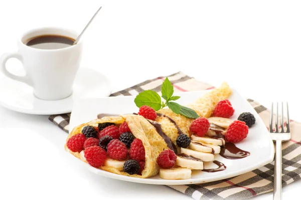 Cup of coffee and pancakes with berries — Stock Photo, Image