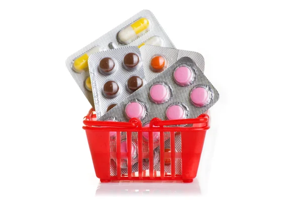 Shopping vagn med piller och medicin isolerad på vit — Stockfoto