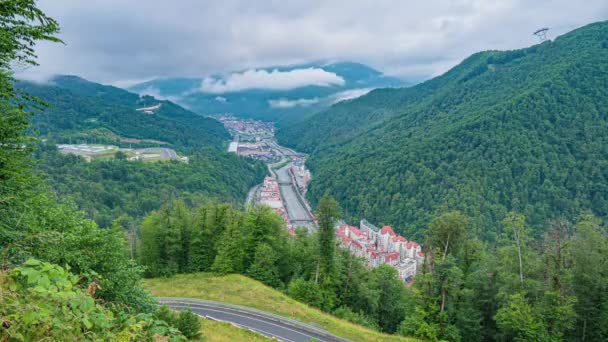 Time lapse video. Aerial view - evening at the Rosa Khutor ski resort. Fog dissipating after rain, beautiful mountain evening landscape — Stock Video