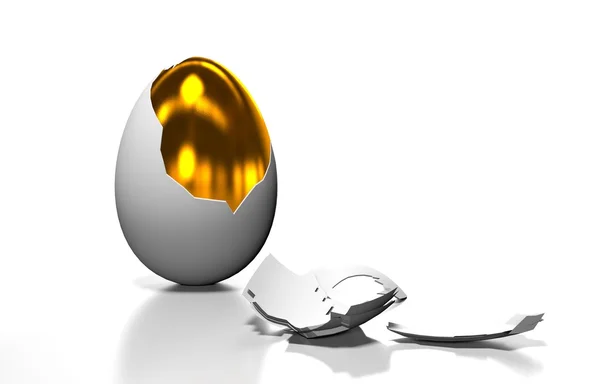 Gouden ei is in de gebroken shell — Stockfoto