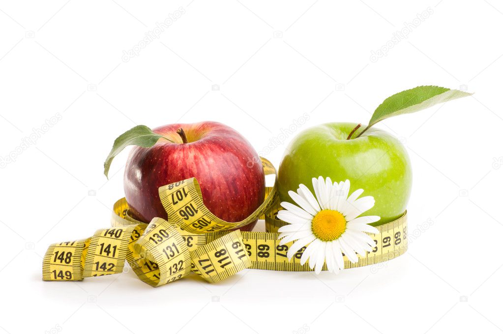Apples, flowers and measuring tape.