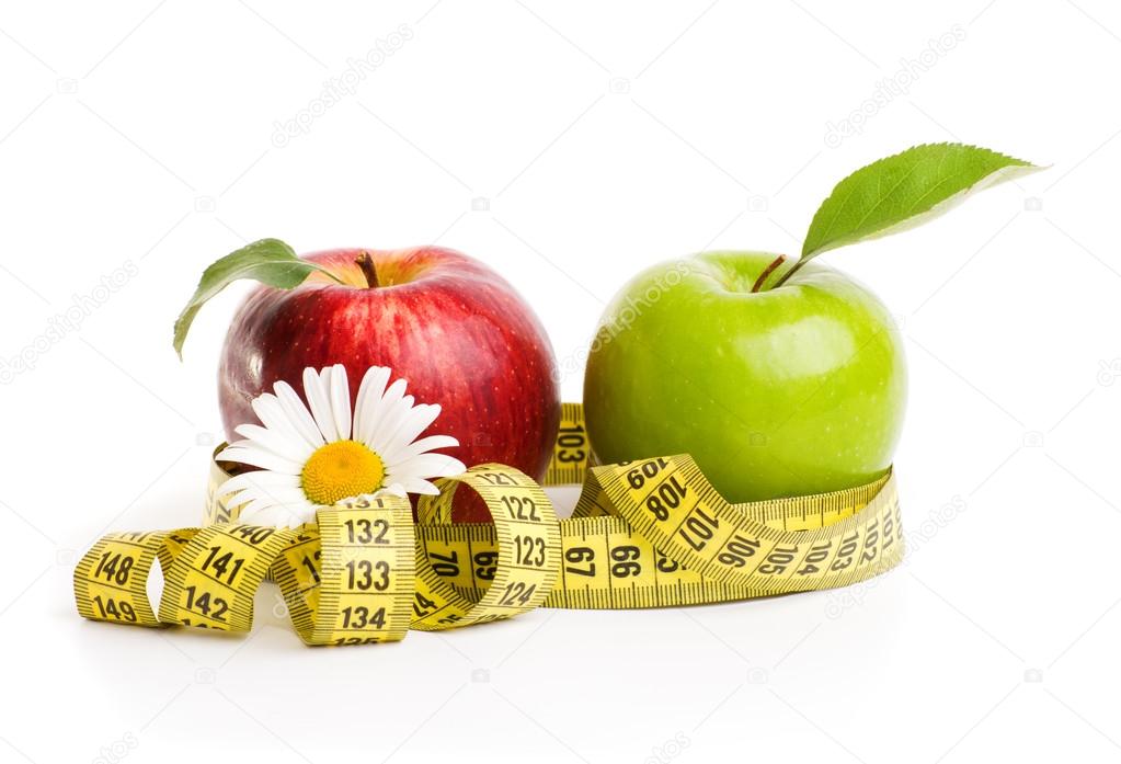 Apples, flowers and measuring tape.