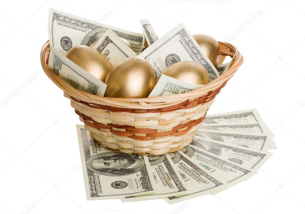 golden eggs and dollars in a basket isolated