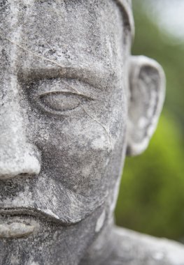 Antik Asya taş savaşçı heykeli