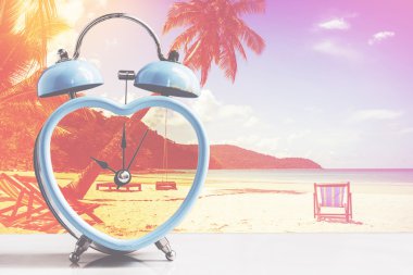 retro clock on tropical white sand beach