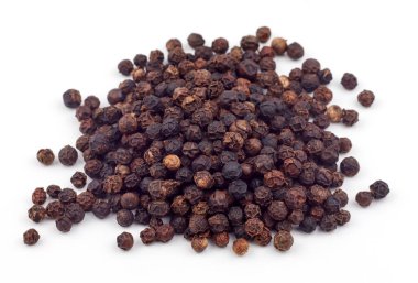 Beyaz arkaplanda siyah biber