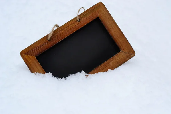 Fundo placa preta com neve no inverno — Fotografia de Stock