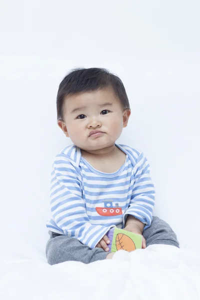 Displeased Chinese baby boy in sailor suit — Stock Photo, Image