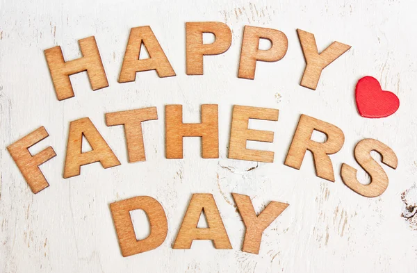 Happy Fathers Day met houten letters op een oude witte pagina — Stockfoto