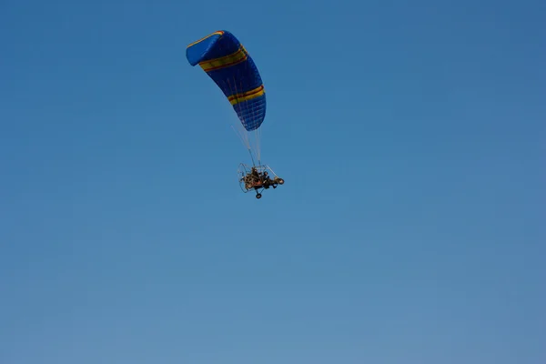 paraglider with a motor in  sky