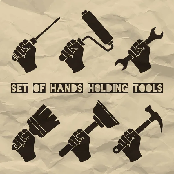 Vektör çizim araçları buruşuk kağıt arka planda tutan eller