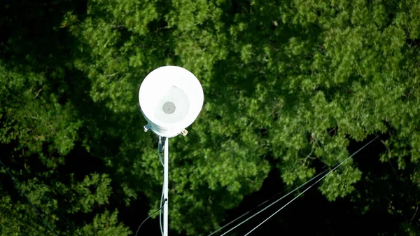 Rain gauge water aerial rainfall shot tower forest wood science research scientific weather meteorology funnel falling atmospheric onto precipitation measurement equipment station plastic machine — Stock fotografie