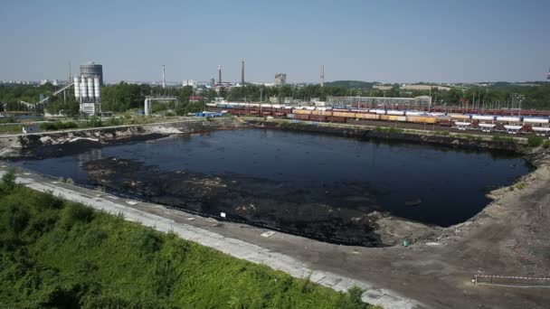 OSTRAVA, CZECH REPUBLIC - AUGUST 3, 2015: The former dump toxic waste in Ostrava, oil lagoon, Ostramo, Moravia-Silesia Region, Europe, EU — Stock Video