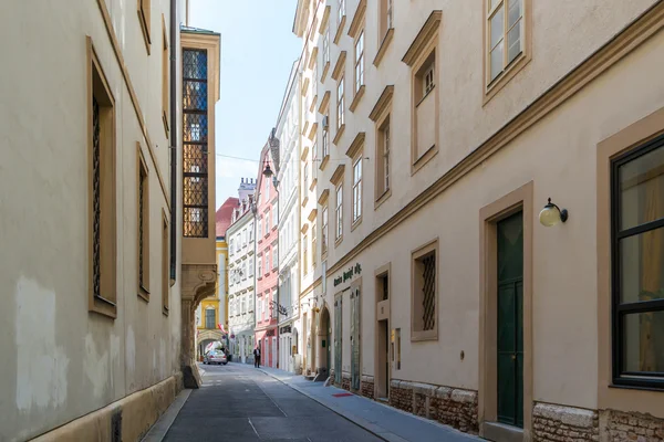 Narrow street in inner city of Vienna, Austria
