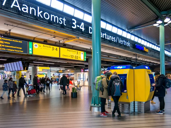 People in railway terminal at Schiphol Amsterdam Airport, Hollan
